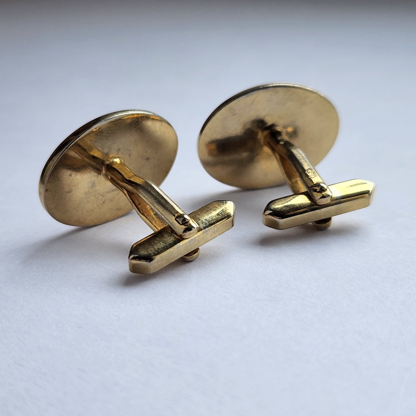 Pair of gold-tone cufflinks from the back