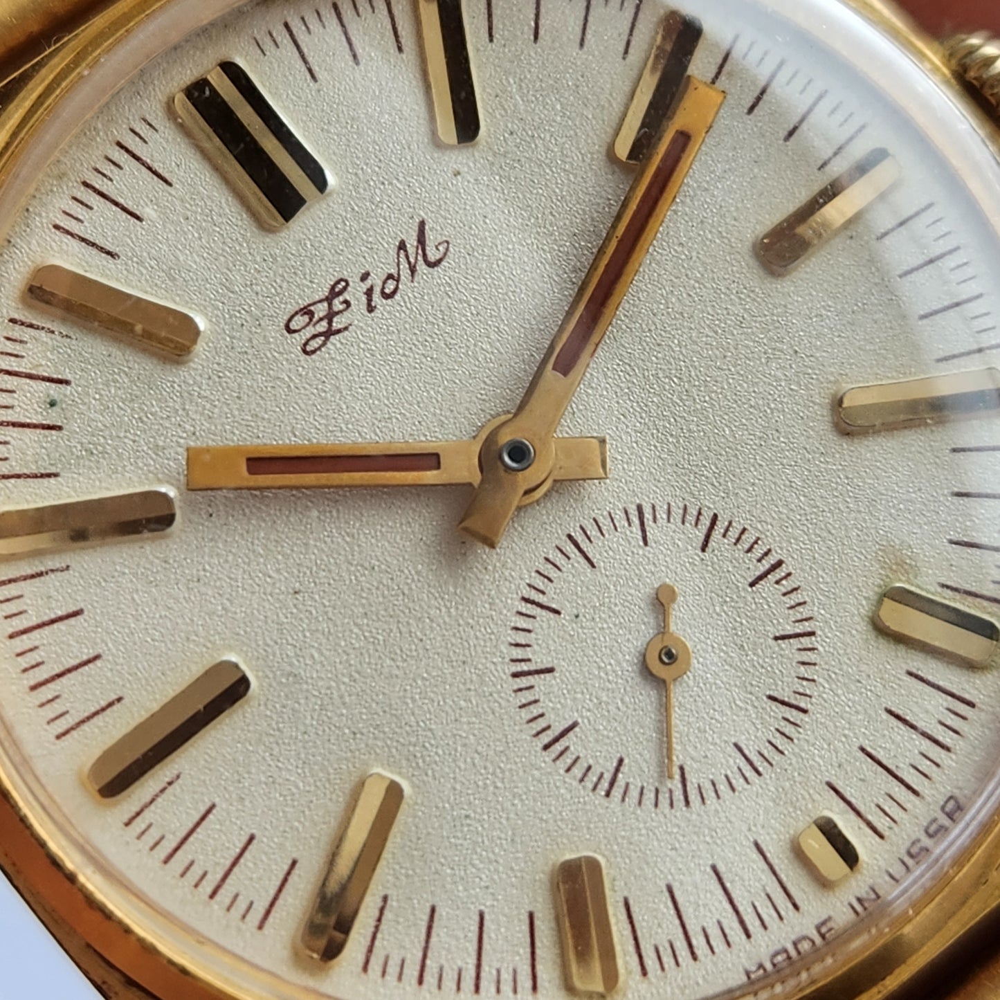 Classic Soviet-era ZIM 2602 men's wristwatch with a gold-plated case