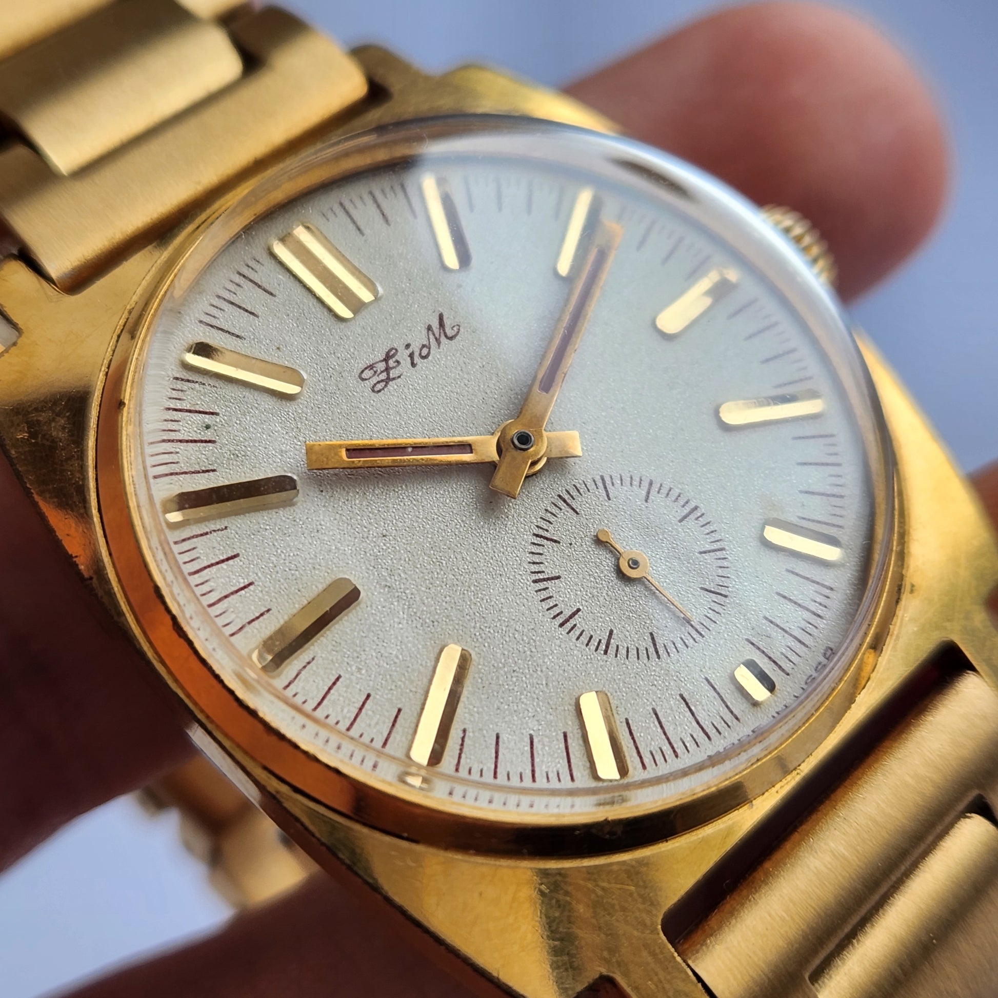 Close-up of a vintage men's ZIM 2602 gold-plated watch from the USSR